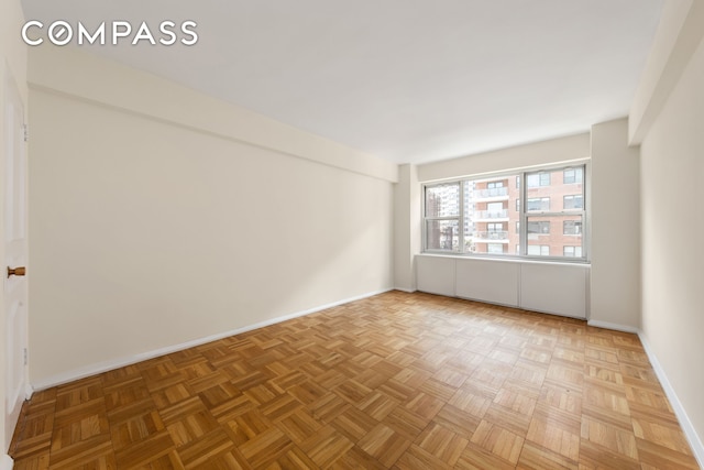 45 Sutton Pl S Unit 14N, New York City, NY 10022 - empty room with baseboards