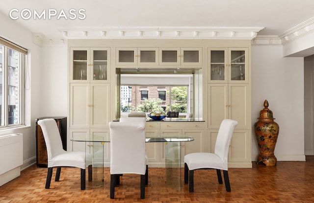 475 Park Ave Unit 3C, New York City, NY 10022 - dining area with ornamental molding and baseboards