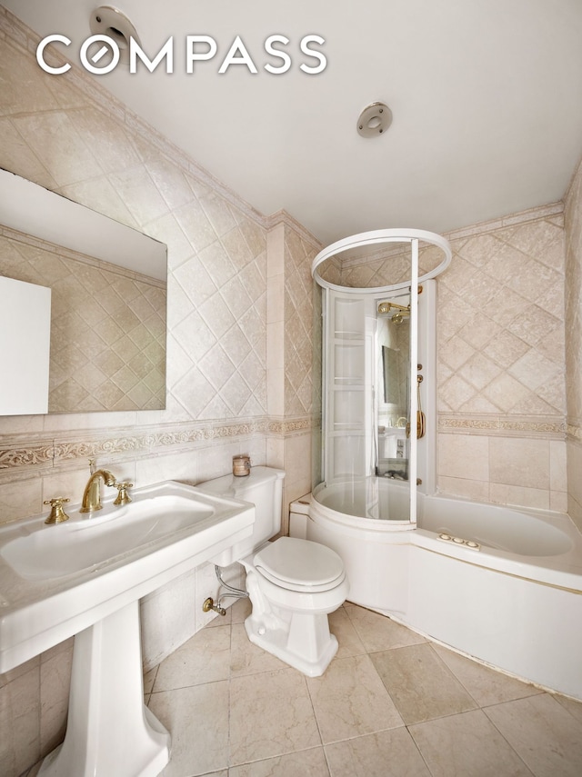 475 Park Ave Unit 3C, New York City, NY 10022 - bathroom featuring tile walls,  shower combination, tile patterned floors, and decorative backsplash