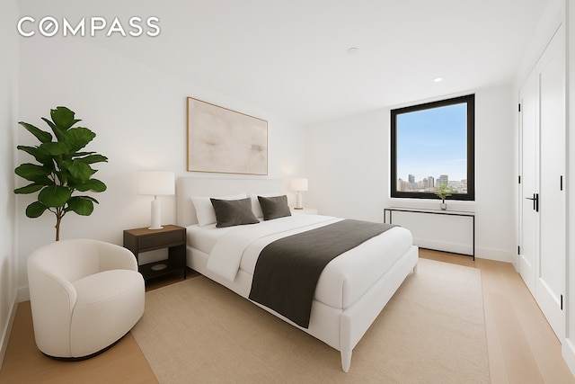 136 E Broadway Pha, Pha, New York City, NY 10002 - bedroom with light wood finished floors and recessed lighting