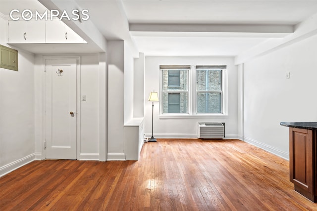 155 E 49th St Unit 8C, New York City, NY 10017 - entryway with wood-type flooring and beamed ceiling