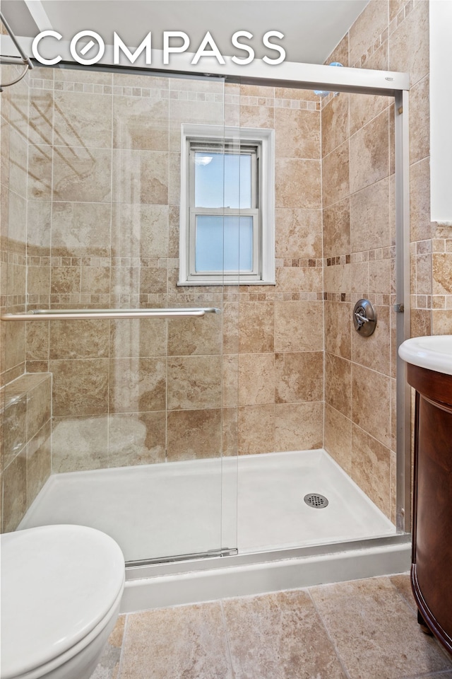 155 E 49th St Unit 8C, New York City, NY 10017 - bathroom with a shower stall and vanity