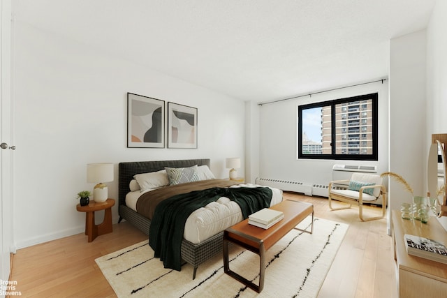 77 Fulton St Unit 9N, New York City, NY 10038 - bedroom featuring light wood-type flooring