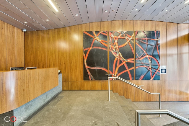 311 W Broadway Unit 3C, New York City, NY 10013 - reception area with wood walls, recessed lighting, and a surveillance system