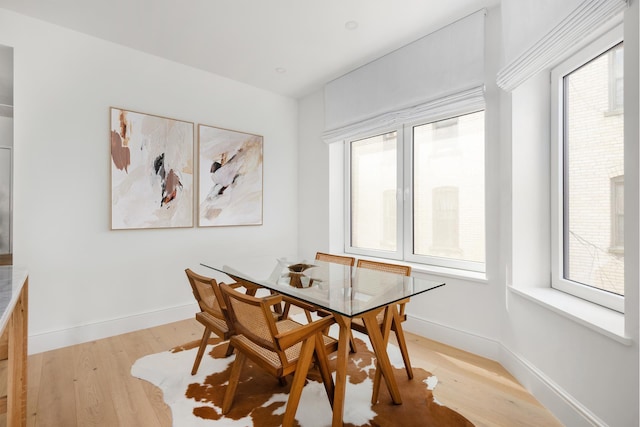 186 Clinton St Unit 4B, New York City, NY 11201 - dining room featuring light wood-style flooring and healthy amount of natural light
