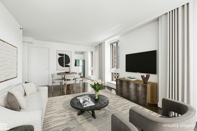 235 E 55th St Unit 41B, New York City, NY 10022 - living room featuring wood finished floors