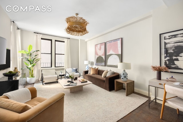 993 Park Ave Unit 4C, New York City, NY 10028 - living area featuring baseboards and dark wood finished floors