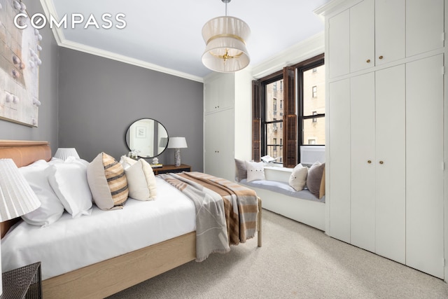 993 Park Ave Unit 4C, New York City, NY 10028 - bedroom featuring crown molding, light carpet, and a closet