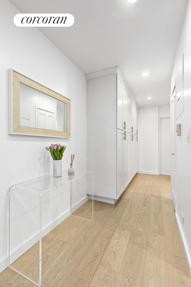 626 Washington St Unit 1B, New York City, NY 10014 - corridor with light wood finished floors and recessed lighting