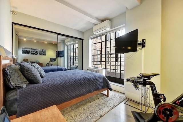 10 Park Ave Unit 26-S, New York City, NY 10016 - bedroom featuring an AC wall unit and multiple windows