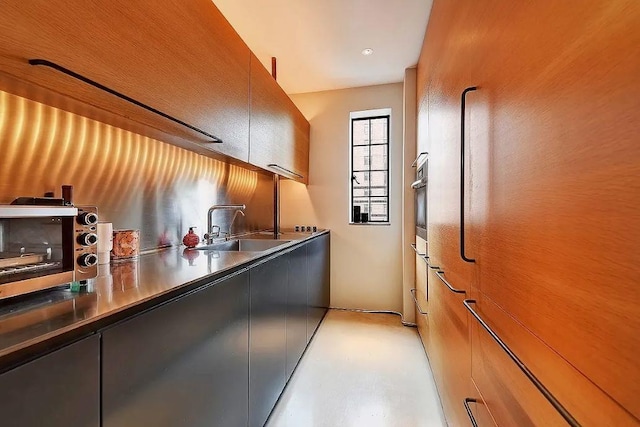 10 Park Ave Unit 26-S, New York City, NY 10016 - kitchen featuring modern cabinets and oven