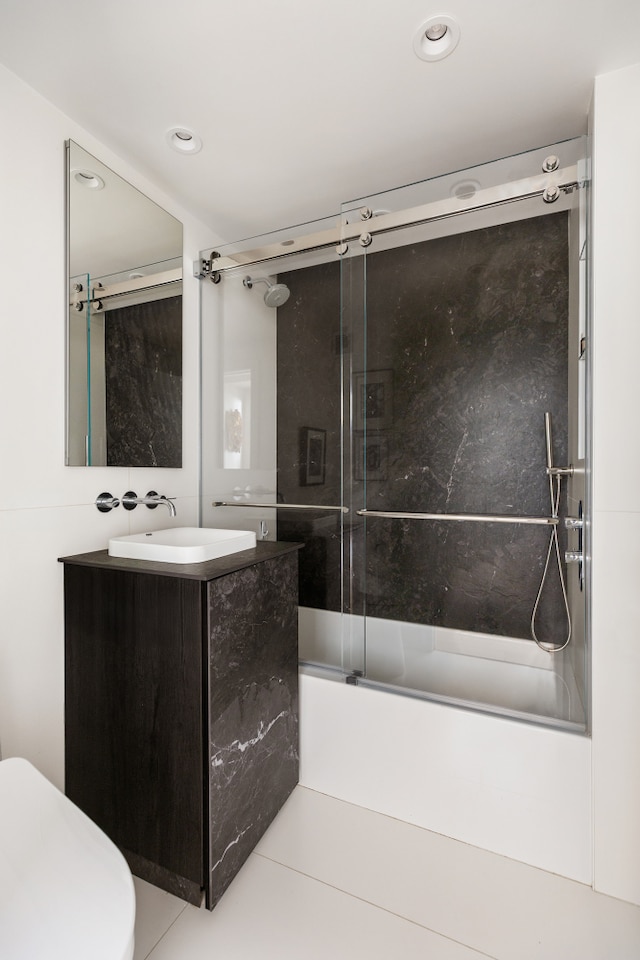 45 Sutton Pl S Unit 8H, New York City, NY 10022 - bathroom featuring vanity, shower / bath combination with glass door, recessed lighting, and tile patterned floors