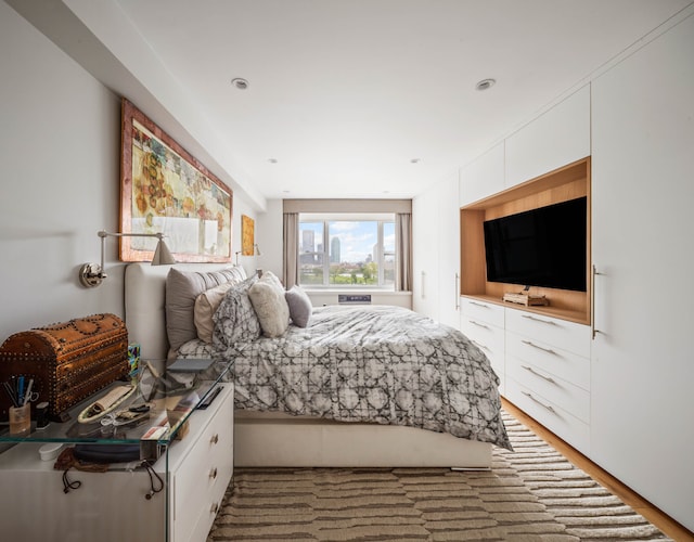 45 Sutton Pl S Unit 8H, New York City, NY 10022 - bedroom featuring light wood-style floors