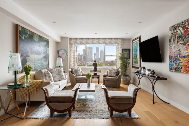 45 Sutton Pl S Unit 8H, New York City, NY 10022 - living room with hardwood / wood-style floors and recessed lighting