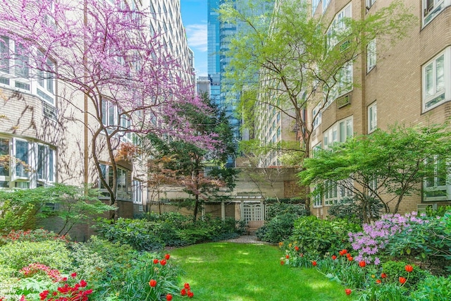 333 W 57th St Unit 704, New York City, NY 10019 - view of property's community featuring a lawn