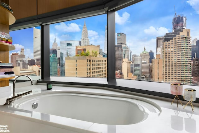 50 United Nations Plz Unit 28B, New York City, NY 10017 - bathroom with a skyline view and healthy amount of natural light