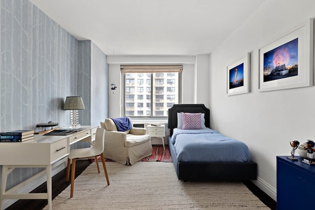 300 E 74th St Unit 23G, New York City, NY 10021 - bedroom with wood finished floors