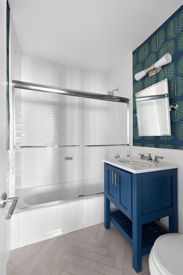 300 E 74th St Unit 23G, New York City, NY 10021 - full bathroom with shower / bath combination with glass door and double vanity