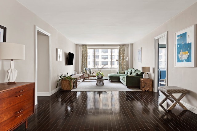 300 E 74th St Unit 23G, New York City, NY 10021 - living area with dark wood-style floors