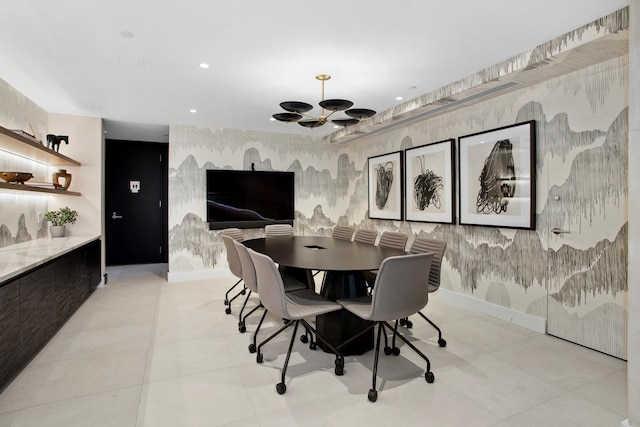 400 E 67th St Unit 20B, New York City, NY 10065 - dining room with wallpapered walls, a chandelier, and recessed lighting