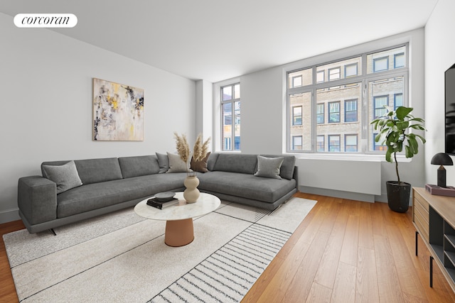125 W 22nd St Unit 9B, New York City, NY 10011 - living room with light wood-style floors