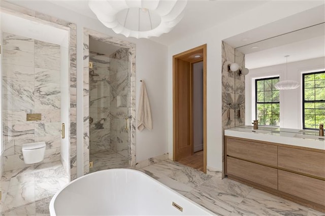 384 Hancock St, New York City, NY 11216 - bathroom featuring vanity, marble tiled floors, a freestanding tub, and a marble finish shower