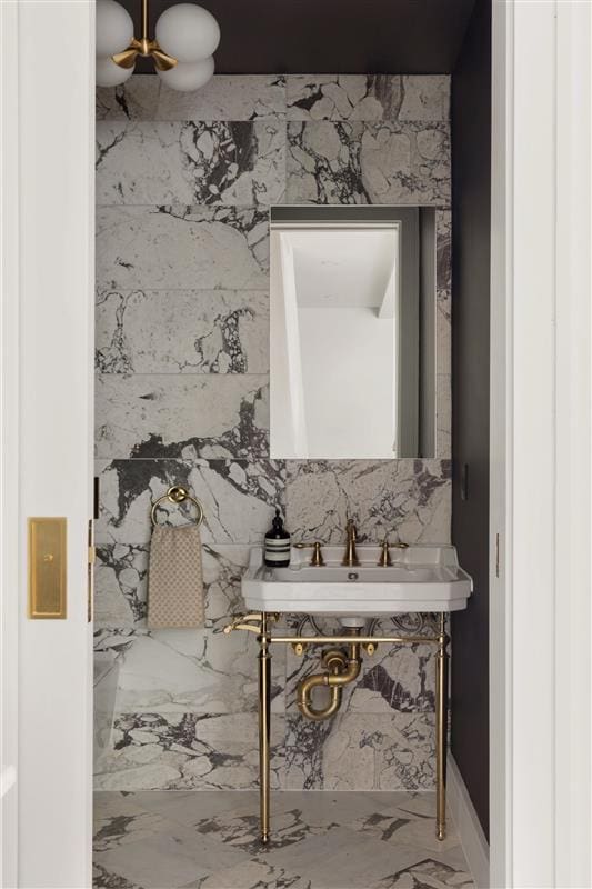 384 Hancock St, New York City, NY 11216 - half bath with marble finish flooring