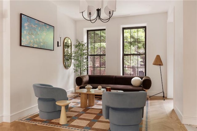 384 Hancock St, New York City, NY 11216 - living area with a chandelier and baseboards