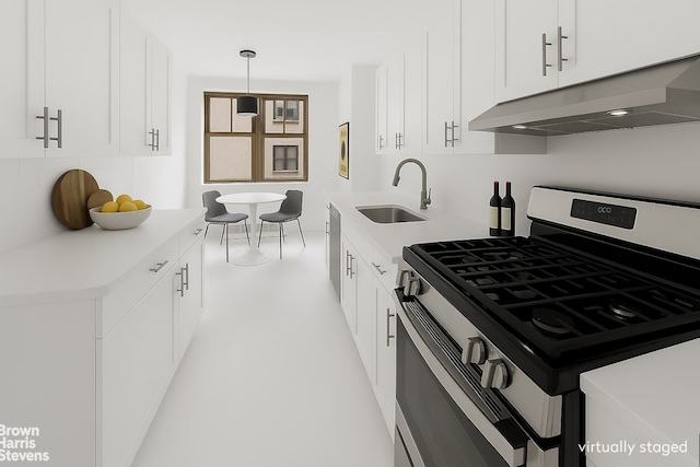 433 E 51st St Unit 11E, New York City, NY 10022 - kitchen with stainless steel gas stove, under cabinet range hood, tasteful backsplash, and light countertops