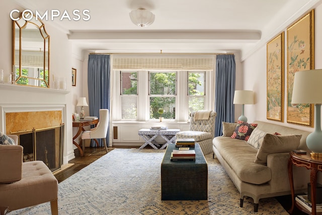 163 E 81st St Unit 3A, New York City, NY 10028 - living room with a high end fireplace and wood finished floors