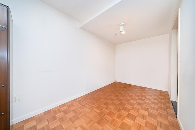 300 W 135th St Unit 4L, New York City, NY 10030 - spare room featuring baseboards