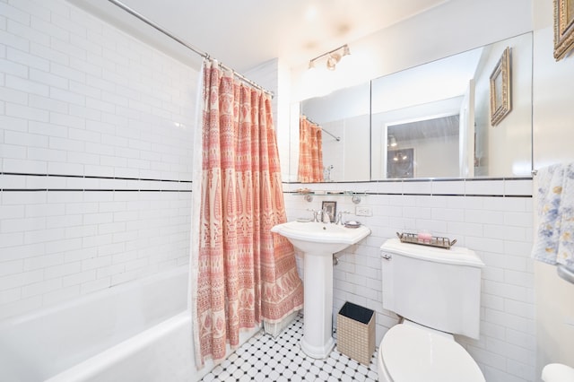 300 W 135th St Unit 4L, New York City, NY 10030 - full bathroom featuring tile walls, shower / tub combo, and tile patterned flooring