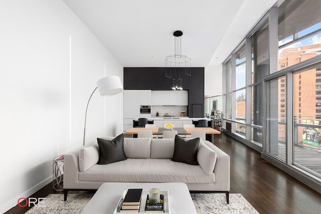 1 York St Unit 6E, New York City, NY 10013 - living room with dark wood finished floors and a chandelier