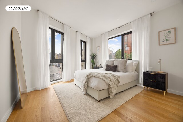 658 Washington Ave Unit 2, New York City, NY 11238 - bedroom with access to exterior and light wood-type flooring
