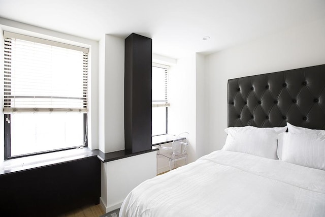 150 W 51st St Unit 1623, New York City, NY 10019 - bedroom featuring wood finished floors