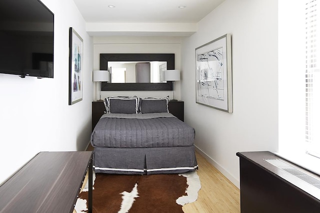 150 W 51st St Unit 1623, New York City, NY 10019 - bedroom featuring wood finished floors and recessed lighting