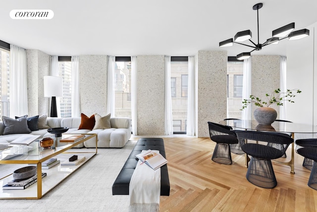 16 W 40th St Unit 25B, New York City, NY 10018 - living area featuring wallpapered walls and a chandelier