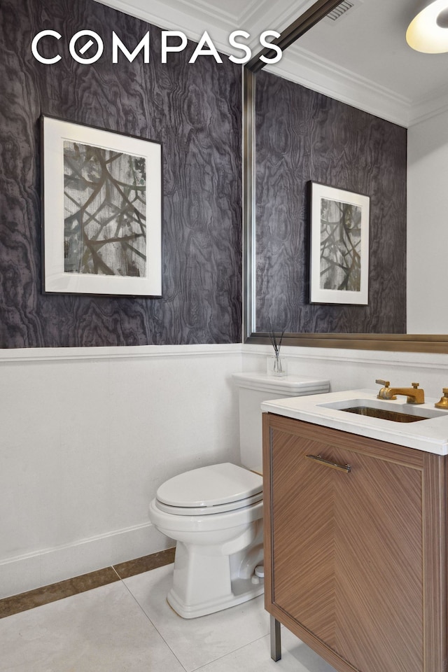 100 Barclay St Unit 15B, New York City, NY 10007 - half bathroom featuring vanity, tile patterned flooring, wainscoting, ornamental molding, and wallpapered walls