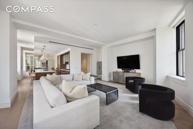 100 Barclay St Unit 15B, New York City, NY 10007 - living room with light wood-style floors and baseboards