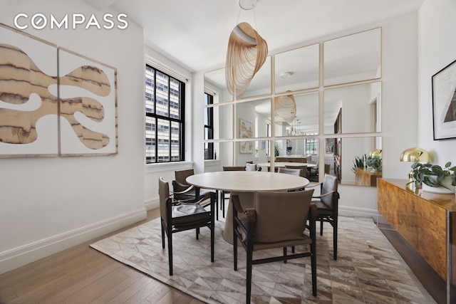 100 Barclay St Unit 15B, New York City, NY 10007 - dining room with baseboards and wood finished floors