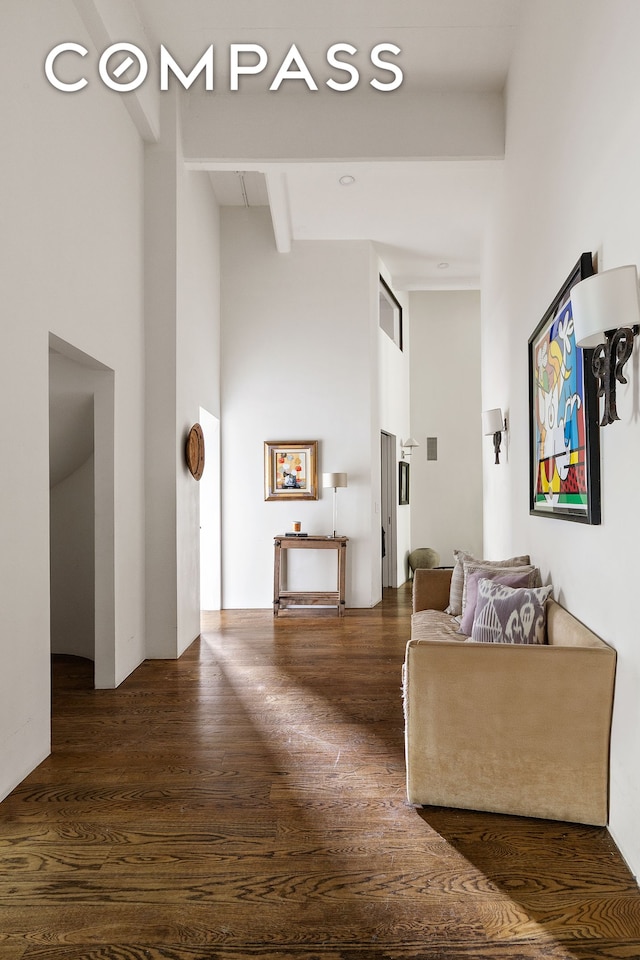 377 W 11th St Unit 3A, New York City, NY 10014 - hall featuring a high ceiling, wood finished floors, and beamed ceiling