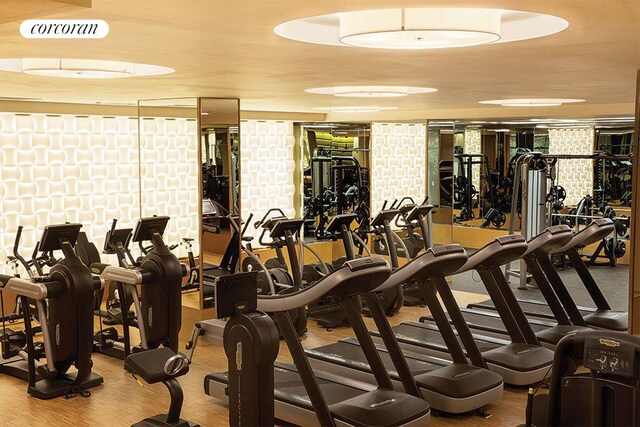 200 E 94th St Unit 405, New York City, NY 10128 - workout area with wood finished floors
