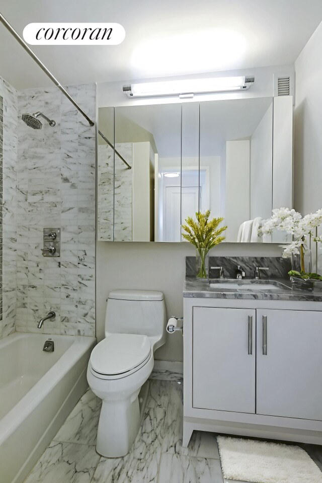 200 E 94th St Unit 405, New York City, NY 10128 - bathroom featuring bathing tub / shower combination, marble look tile flooring, and vanity