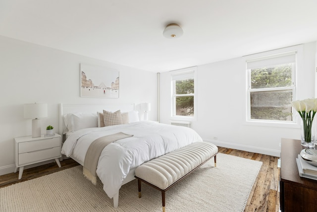 211 Powers St, New York City, NY 11211 - bedroom featuring wood finished floors and baseboards