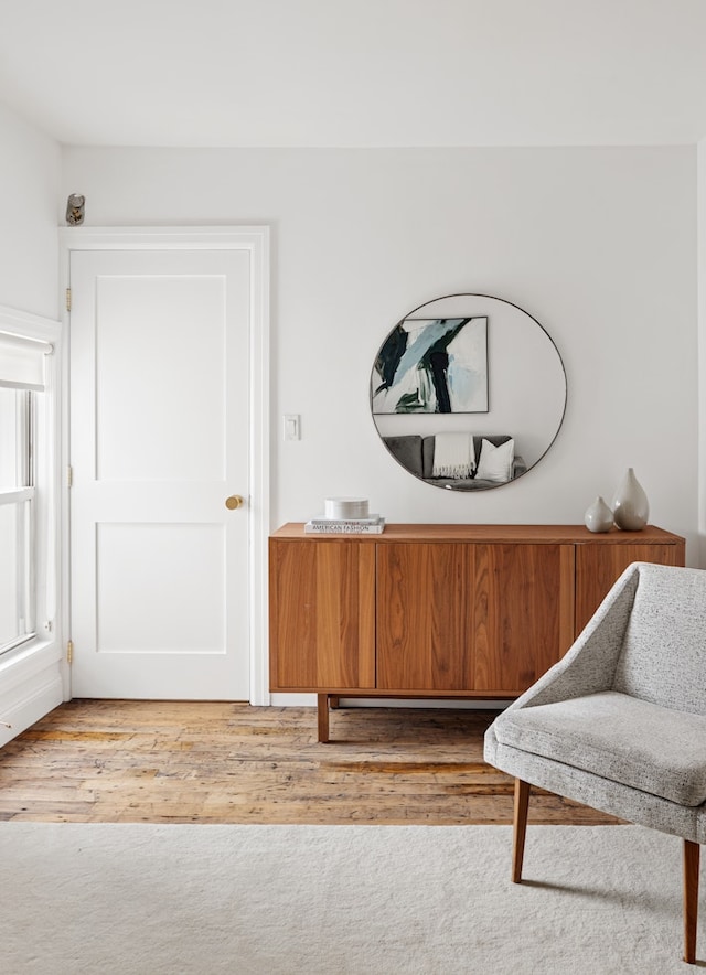 211 Powers St, New York City, NY 11211 - living area with light wood-style flooring