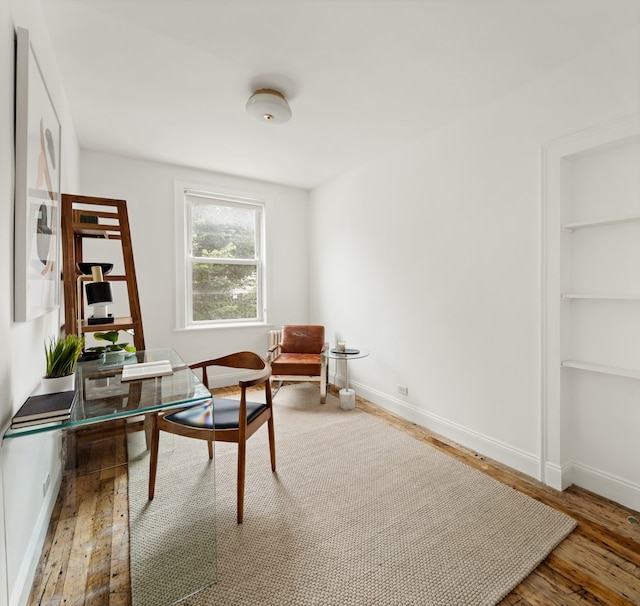 211 Powers St, New York City, NY 11211 - office space featuring hardwood / wood-style flooring and built in features