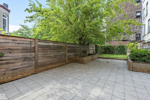 1148 Sterling Place, New York City, NY 11213 - fenced backyard with a patio
