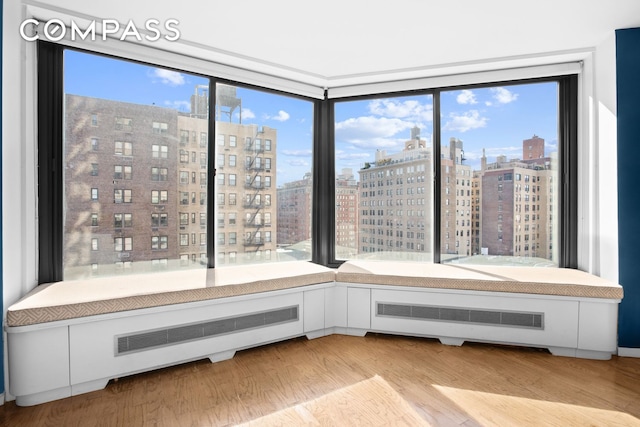40 E 94th St Unit 13G, New York City, NY 10128 - unfurnished room with a view of city and wood finished floors