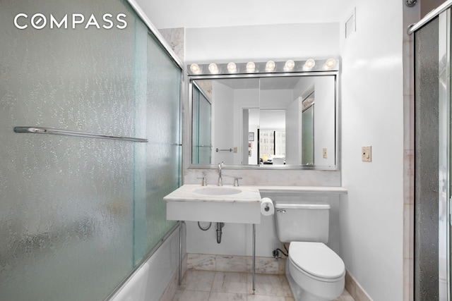 40 E 94th St Unit 13G, New York City, NY 10128 - full bath with combined bath / shower with glass door and marble look tile flooring