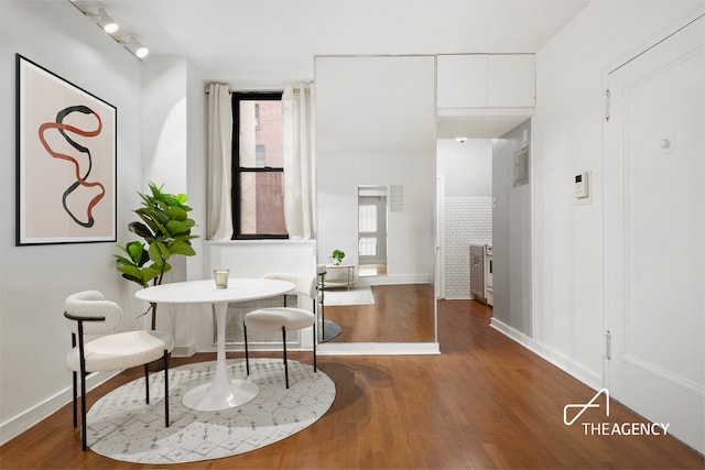 138 E 36th St Unit 1B, New York City, NY 10016 - dining area featuring wood finished floors and rail lighting